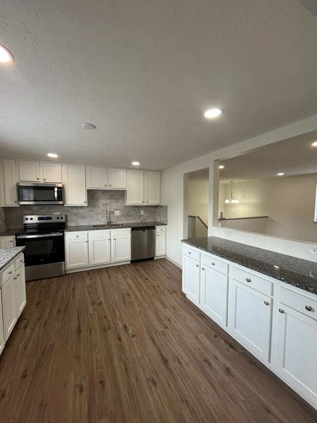 Building Photo - Renovated 5 Bedroom Home-Rare Find