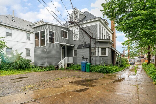 Building Photo - Historic Charm Meets Modern Living in the Heart of Lowry Hill