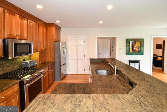 Building Photo - Discover exceptional comfort and timeless style in this beautifully updated single family residen...