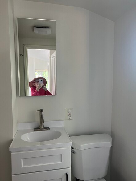 Bathroom sink and medicine chest - 15138 Encanto Dr