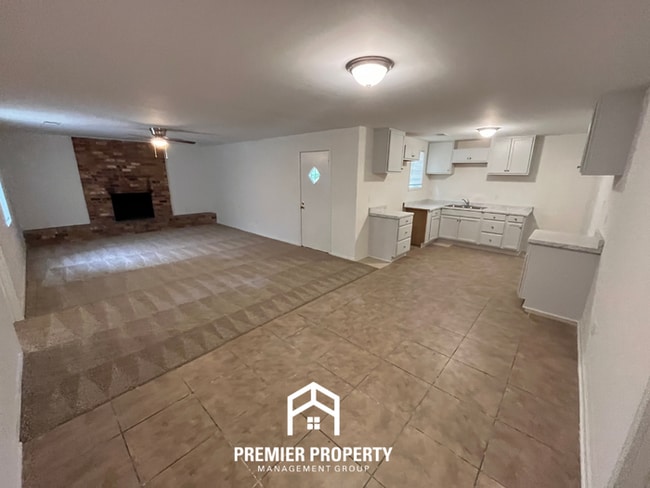 Building Photo - Spacious 3BR/2BA Home with Den & Living Room | Brick Fireplace & Large Yard