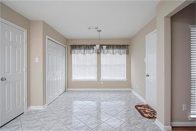 Building Photo - 7210 Greenwood Point Dr