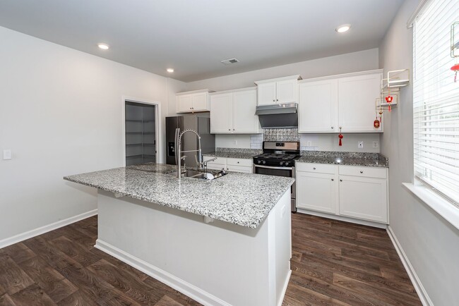 Building Photo - 4 Bedroom 2.5 Bath Home in Cane Bay Planta...
