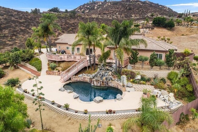 Building Photo - Stunning 4BR/3BA Pool Home in Singing Hill...