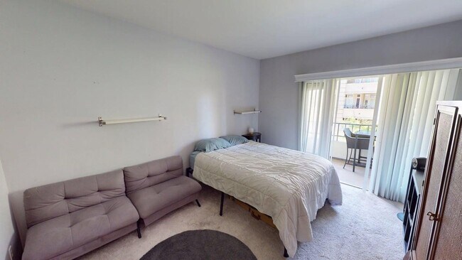 Building Photo - Upgraded 2bd/2Ba Mariana District Condo - ...