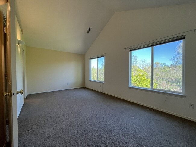 Building Photo - Spacious 3 Bedroom Home with Open Layout, Vaulted Bedrooms & Trail Access