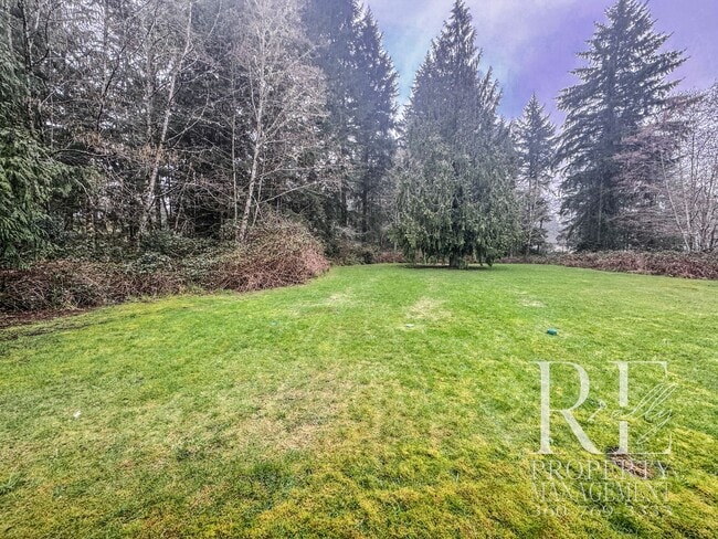 Building Photo - Duplex Living with Expansive Yard, LVP Flooring & Spacious Layout