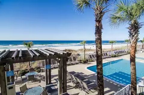 Swim, grill, and relax — the pool and BBQ pavilion make the perfect spot for family fun - 10625 Front Beach Rd