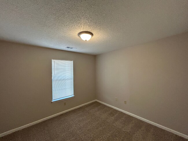 Building Photo - Spacious 3BR/2BA Lake Community Home | Soaring High Ceilings, Fireplace & 2-Car Garage