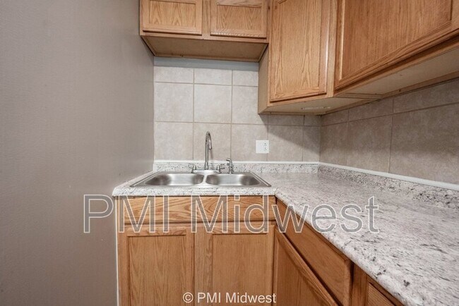 Building Photo - 6260 E 11th St