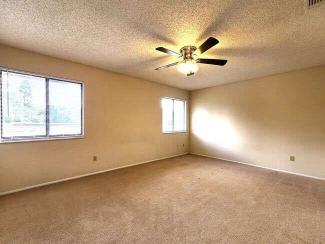 Building Photo - Open Layout; Fenced-in Yard; Quiet Neighbo...