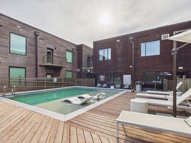 Building Photo - Modern East Austin Condo with City Views & Unmatched Walkability