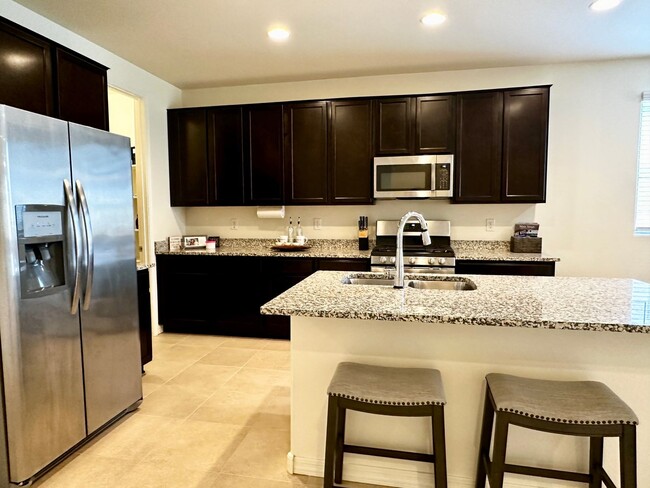 Building Photo - BEAUTIFUL VERRADO 3 BEDROOM PLUS DEN WITH ...