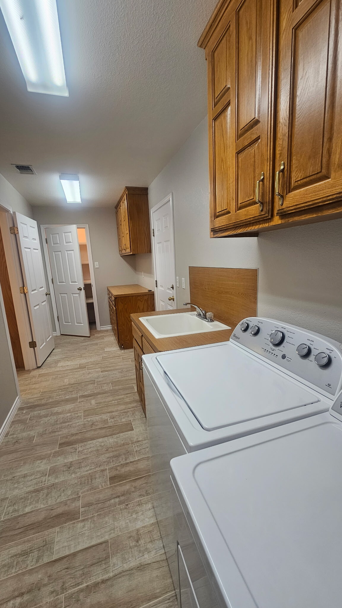 Massive Utility Room with tons of storage - 203 Bluebonnet St