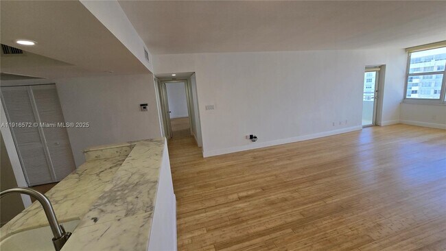 Building Photo - 5600 Collins Ave