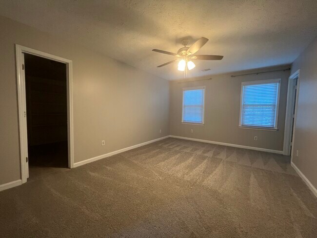primary bedroom (closet on left, office on right) - 1221 Settlebench Ln NW