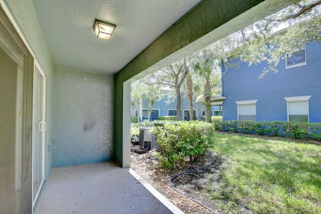 Building Photo - Beautiful 2/2.5 Cozy Townhome with a 1 Car Garage in the Gated Community of Victoria Pines - Orlando