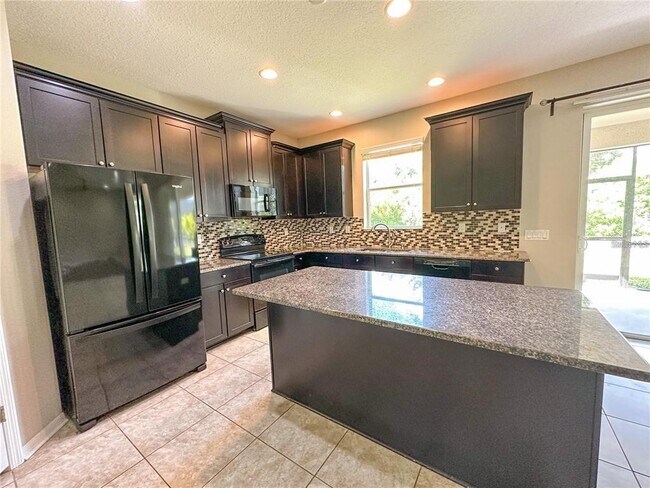 Building Photo - 8979 39th St Cir E