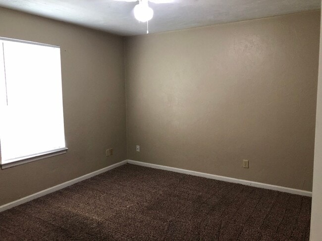 Building Photo - Downstairs unit off Mahan avail NOW!