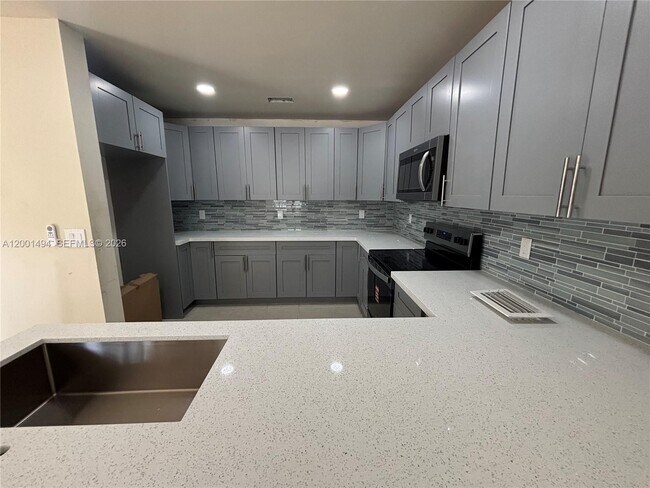 Building Photo - 5450 NW 94th Terrace