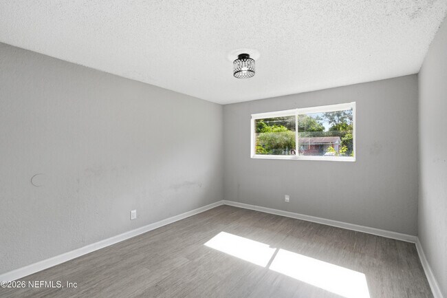 Building Photo - 7386 Dostie Dr E
