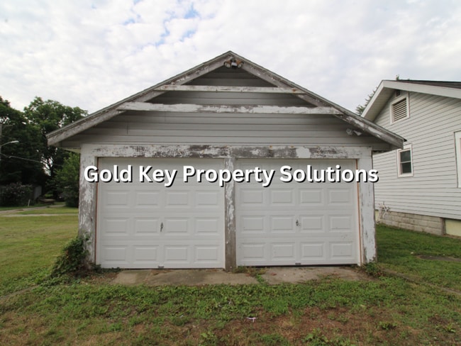 Building Photo - Attractive 2 BR 1 BA House with 2-Car Garage and Covered Porch (NO SECTION 8)