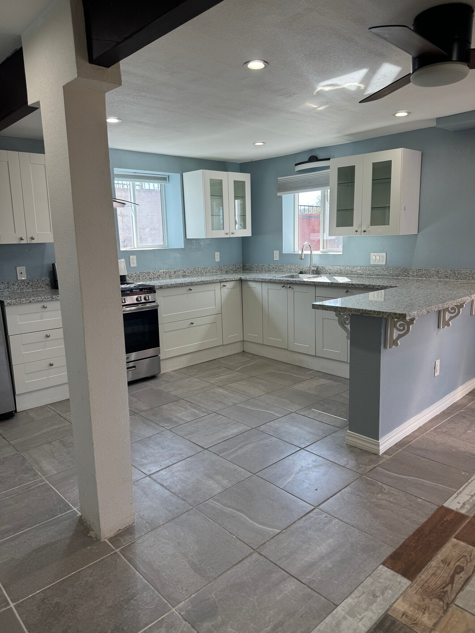 Kitchen view with glass cabinets - 1178 Tiegen Dr