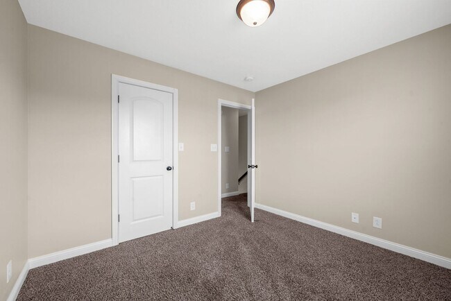 Building Photo - Spacious 4-Bedroom Home with Modern Upgrad...
