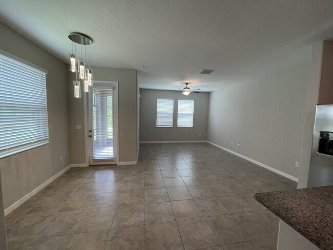 Building Photo - "Charming 3-Bedroom Wesley Chapel Home with Granite Finishes & Spacious 1,807 Sq Ft great Layout....