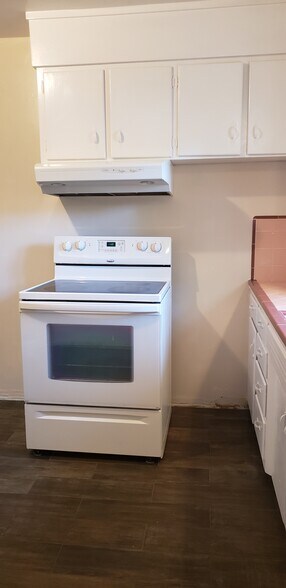 Stove in kitchen - 9662 Eisenbeisz Street Unit A