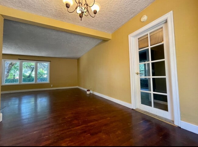 Building Photo - Updated Ranch with Large Fenced Yard, Tucked Off Walker Road~ Gas Fireplace~ Great Natural Light~...