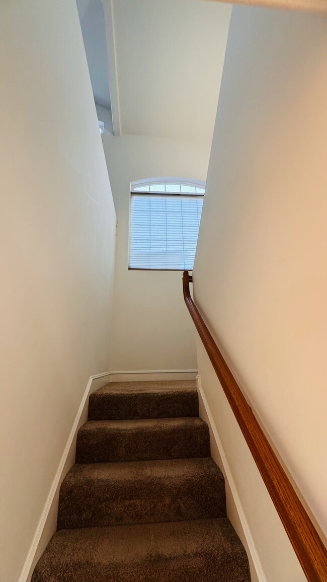 Stairs to the upstairs - giant windows with a lot of light - 2107 Plant Ave