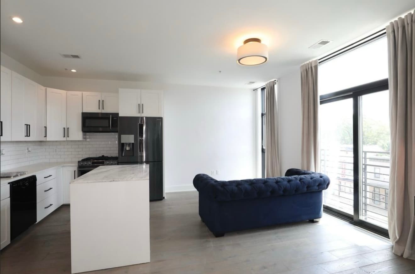 Main living room and kitchen area - 1402 H St NE