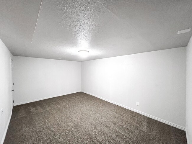 Building Photo - Spacious 5-Bedroom Home with Lofted Garage