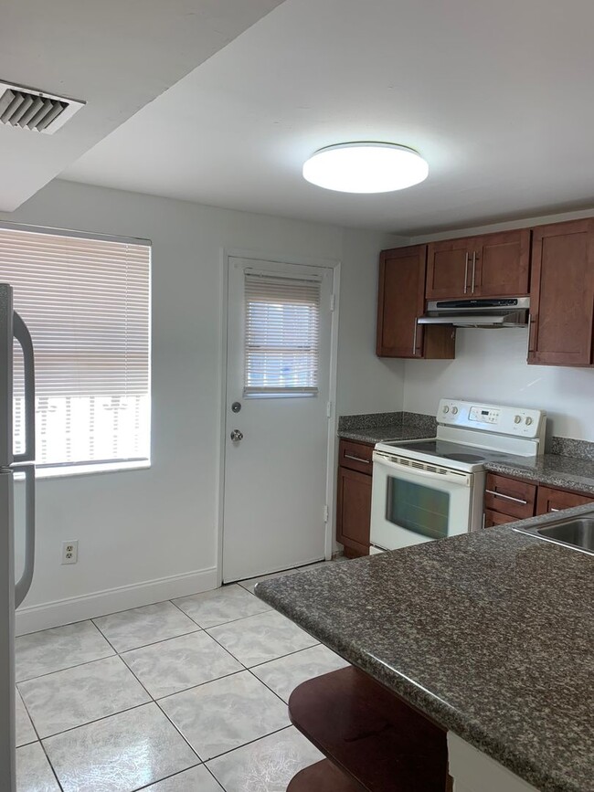 Building Photo - For Rent: Spacious One-Bedroom with Den in...