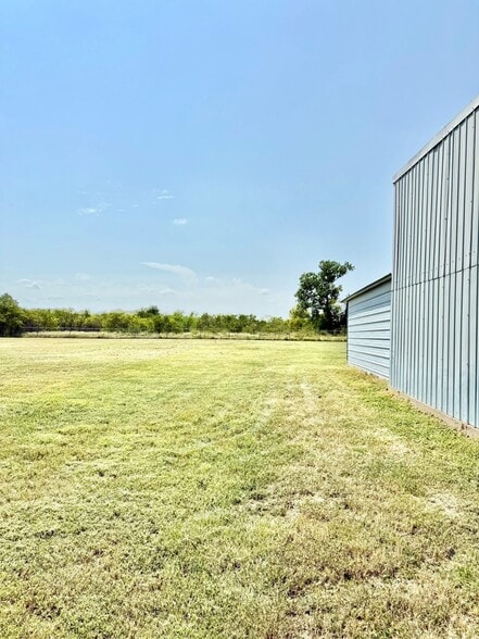 Side of shop - 15693 State Highway 205