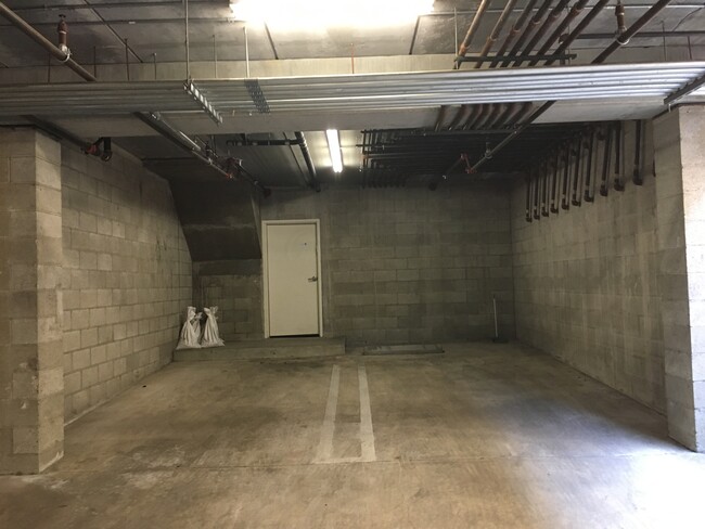 Parking garage with the direct access door to the unit - 13360 Burbank Blvd