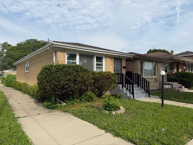 Building Photo - 9756 S Lowe Ave