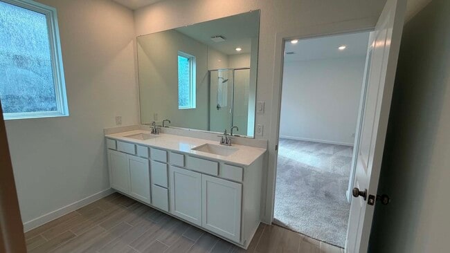 Building Photo - 27451 Sunterra Village Dr