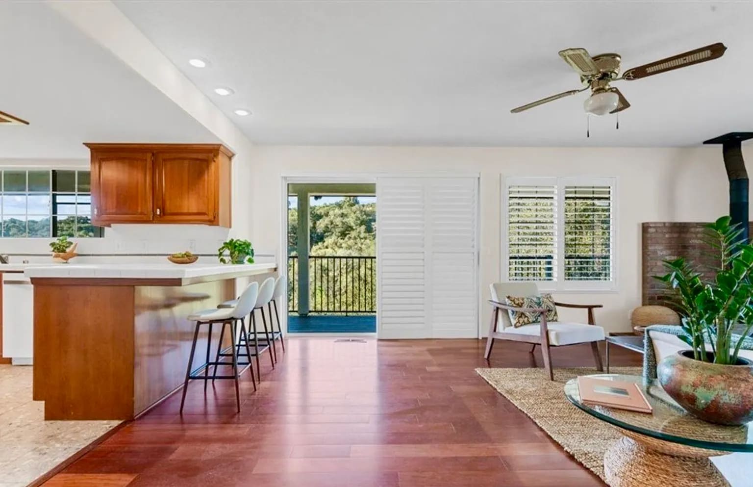 Cherry wood hardwood flooring (note: lighted ceiling fan has been updated). - 221 Appy Way