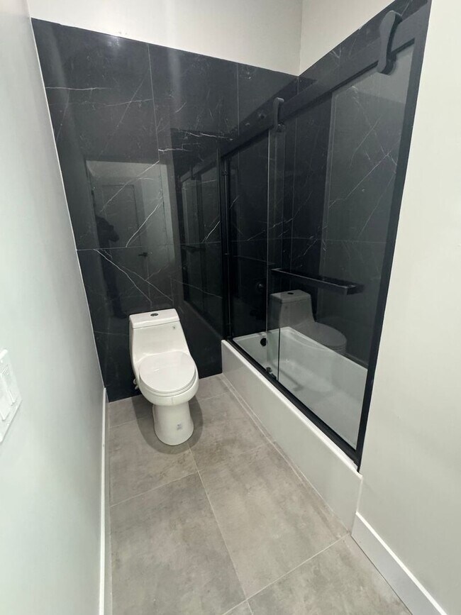 Building Photo - Real Estate Listing: Newly Renovated 2-Bed...