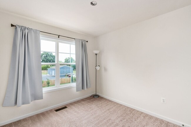 Building Photo - Your Next Home: Modern 3-Level Townhome with Garage, Deck & Huge Flex Space