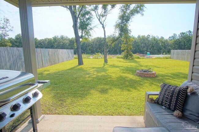 Building Photo - Popular Floor Plan, Almost New Home in Woo...