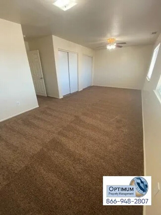 Building Photo - Spacious 4-Bedroom Home with 3-Car Garage & Downstairs Suite!