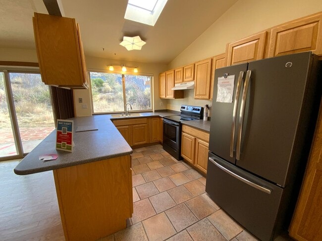 Building Photo - 4 Bedroom Single Story Home Available Near Tramway Blvd NE & Copper Ave NE!