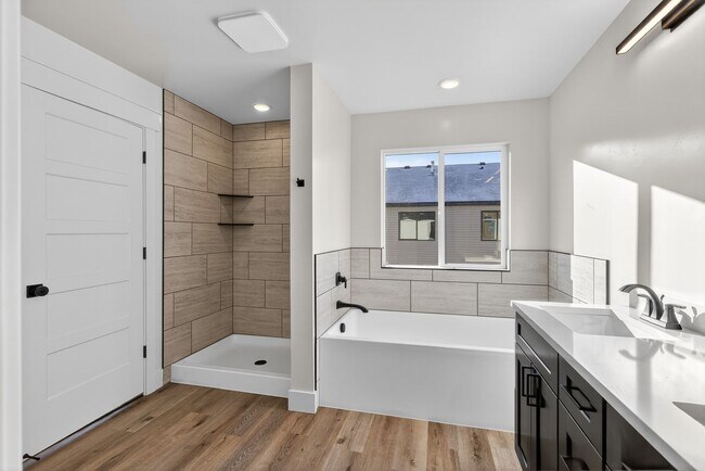 Building Photo - $300 off first month for February move-ins - BRAND NEW 3 BED 2.5 BATH TOWNHOMES WITH 2 CAR GARAGE