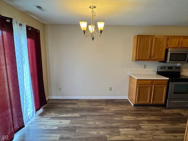 Building Photo - 7644 Scatter Woods Ln