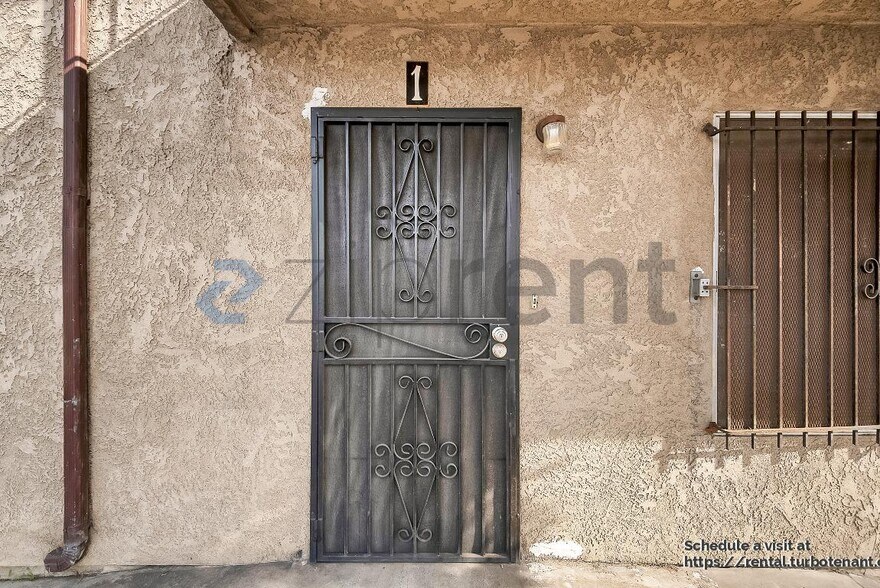 Building Photo - 2458 Normandie Ave