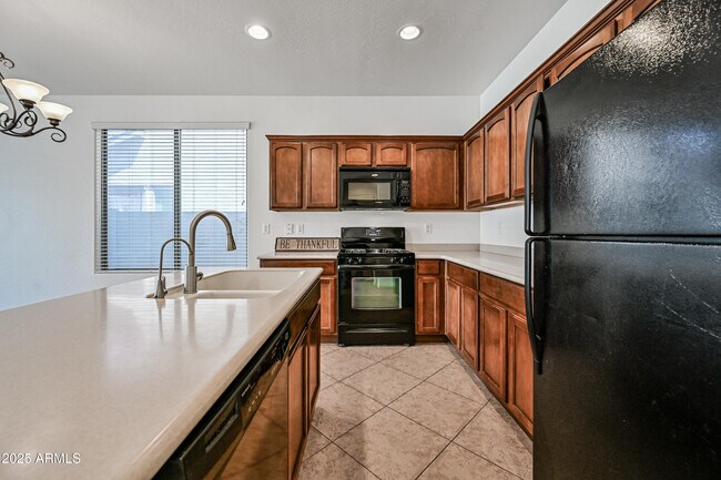 Building Photo - 14536 W Acapulco Ln