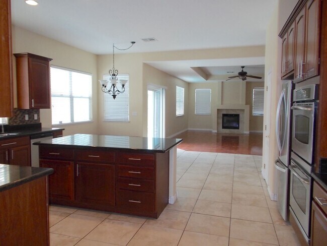 Building Photo - Beautiful 4BR Home with Pool, Loft, and 3-...